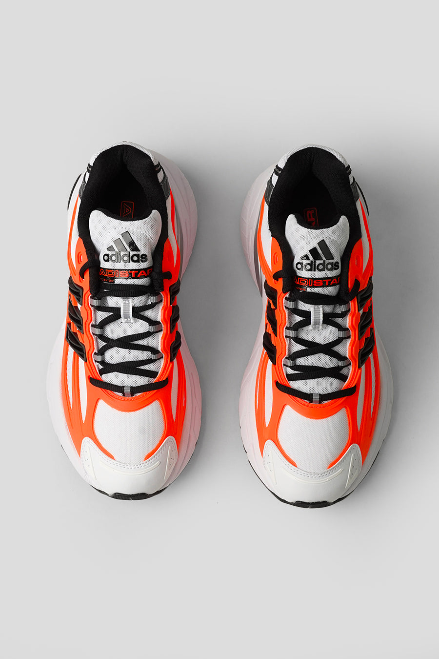 ADIDAS - SNEAKERS ADISTAR XLG 2.0 CLOUD WHITE, CORE BLACK ET SOLAR ORANGE - LE LABO STORE