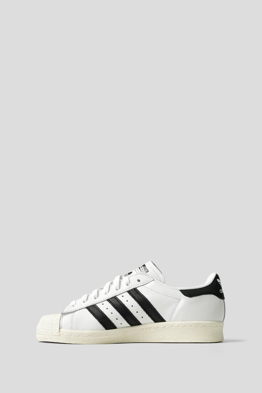 ADIDAS - CLOUD WHITE, CORE BLACK AND OFF WHITE SUPERSTAR 82 SNEAKERS LE LABO STORE ADIDAS - CLOUD WHITE, CORE BLACK AND OFF WHITE SUPERSTAR 82 SNEAKERS LE LABO STORE