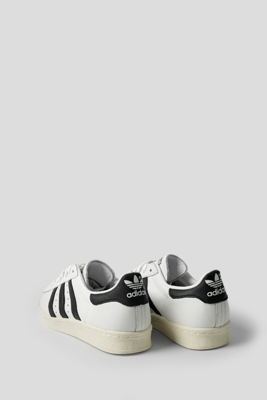 ADIDAS - CLOUD WHITE, CORE BLACK AND OFF WHITE SUPERSTAR 82 SNEAKERS LE LABO STORE ADIDAS - CLOUD WHITE, CORE BLACK AND OFF WHITE SUPERSTAR 82 SNEAKERS LE LABO STORE