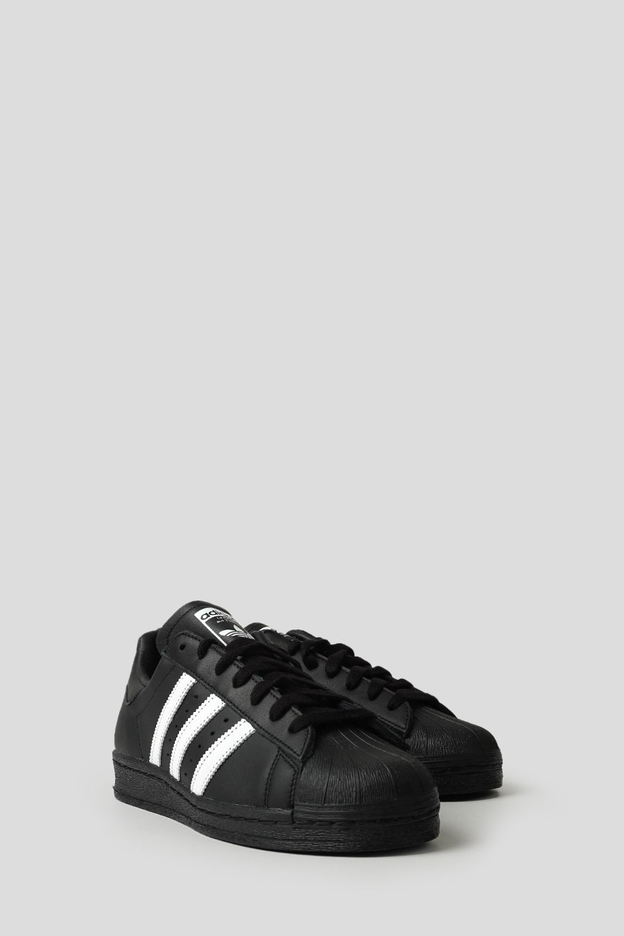 ADIDAS - CORE BLACK AND CLOUD WHITE SUPERSTAR 82 SNEAKERS LE LABO STORE ADIDAS - CORE BLACK AND CLOUD WHITE SUPERSTAR 82 SNEAKERS LE LABO STORE