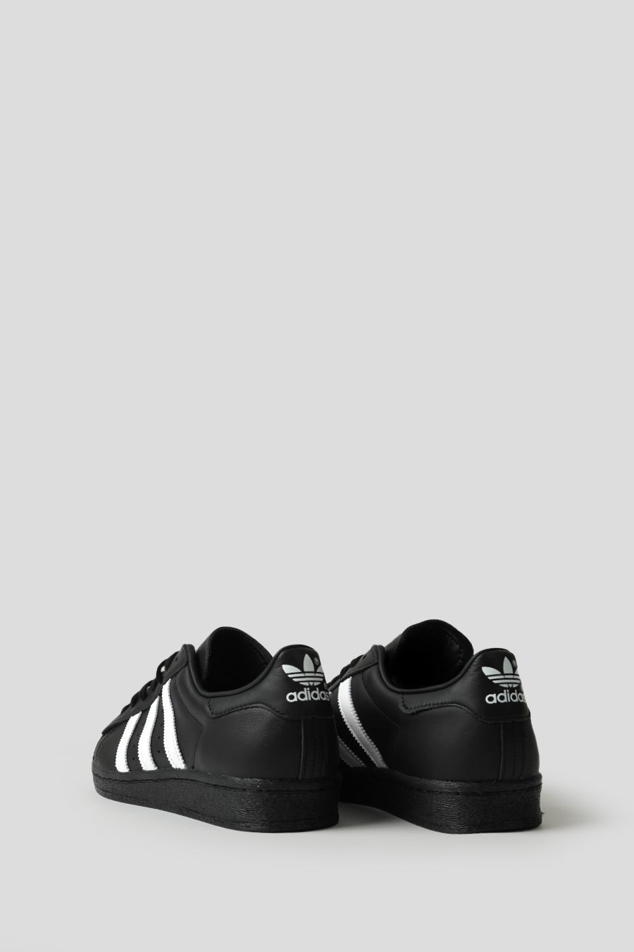 ADIDAS - CORE BLACK AND CLOUD WHITE SUPERSTAR 82 SNEAKERS LE LABO STORE ADIDAS - CORE BLACK AND CLOUD WHITE SUPERSTAR 82 SNEAKERS LE LABO STORE