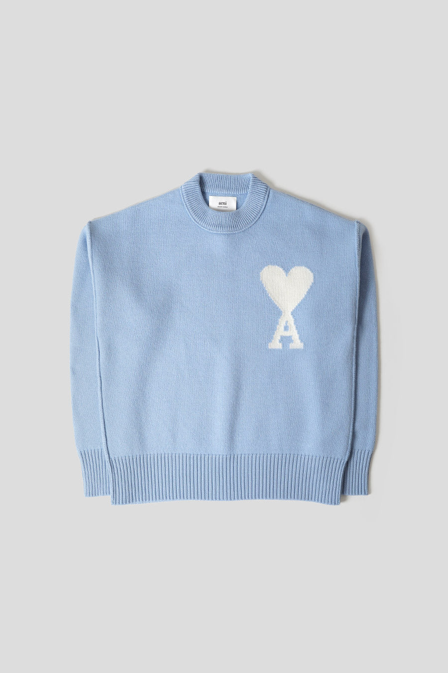 AMI Alexandre Mattiussi: Pull rouge et blanc cassé en tricot jacquard AMI Alexandre Mattiussi: Pull rouge et blanc cassé en tricot jacquard