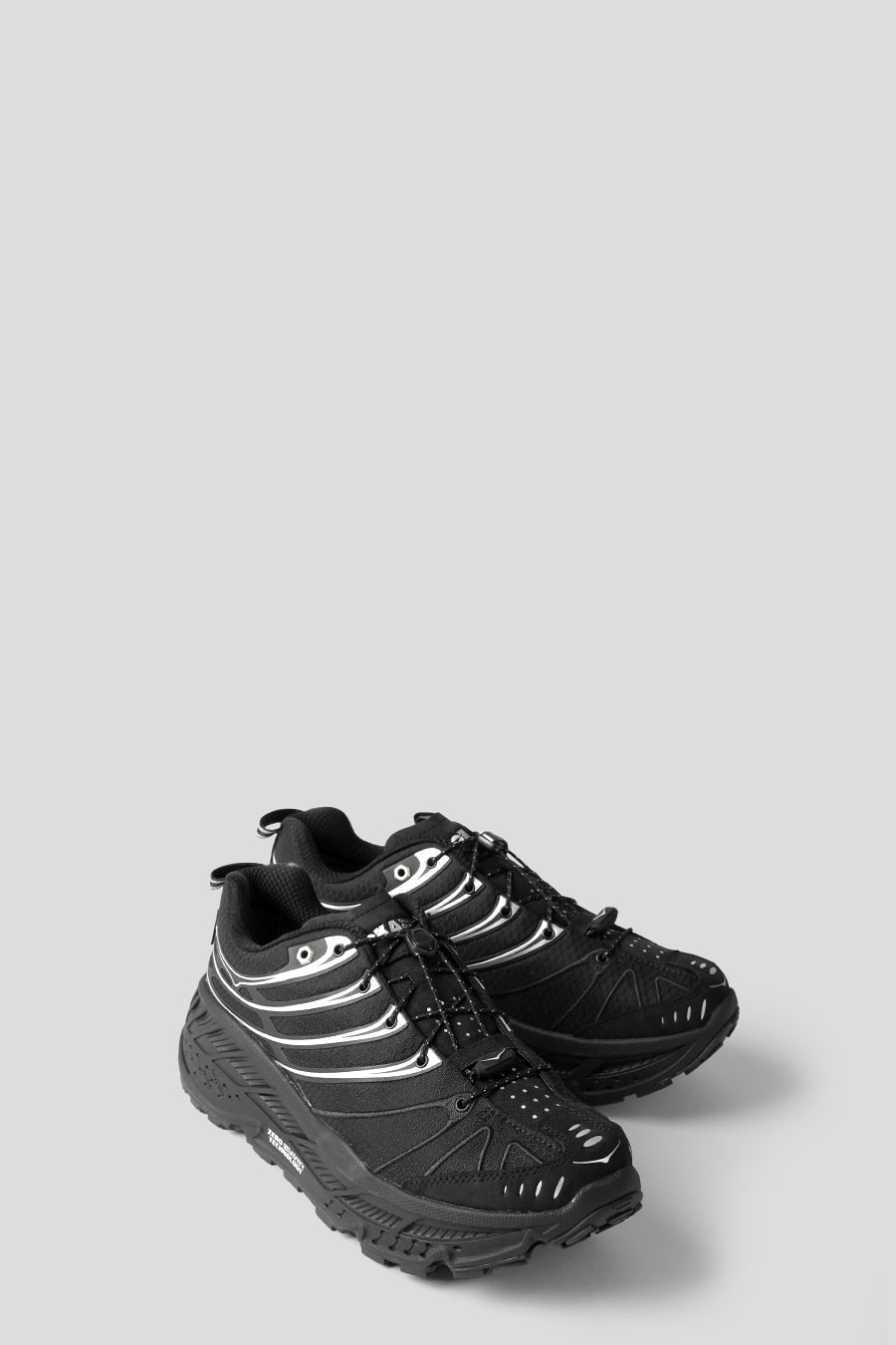 HOKA ONE ONE - SNEAKERS STINSON EVO GTX BLACK ET SLIVER - LE LABO STORE