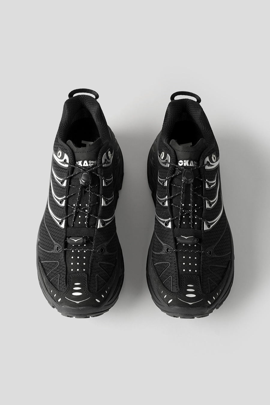 HOKA ONE ONE - SNEAKERS STINSON EVO GTX BLACK ET SLIVER - LE LABO STORE