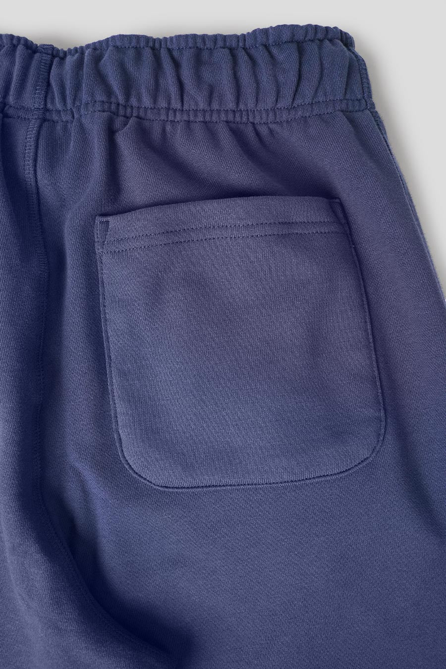 NEW BALANCE - PANTALON DE SURVÊTEMENT ATHLETICS FRENCH TERRY BLEU MARINE - LE LABO STORE