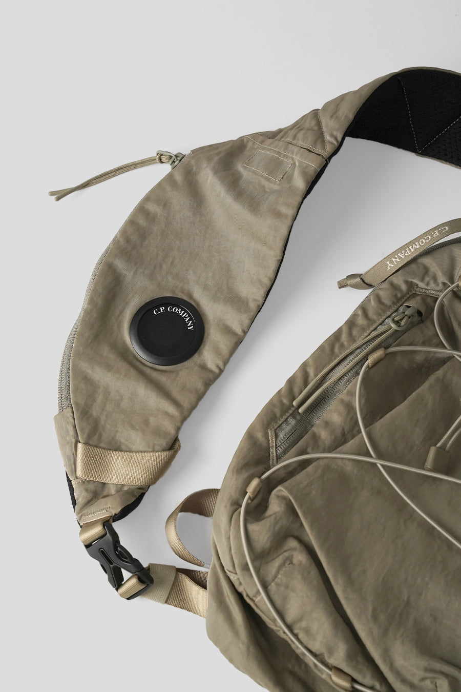 CP COMPANY - NYLON B LENS CROSSBODY RUCKSACK GREY BACKPACK - LE LABO STORE