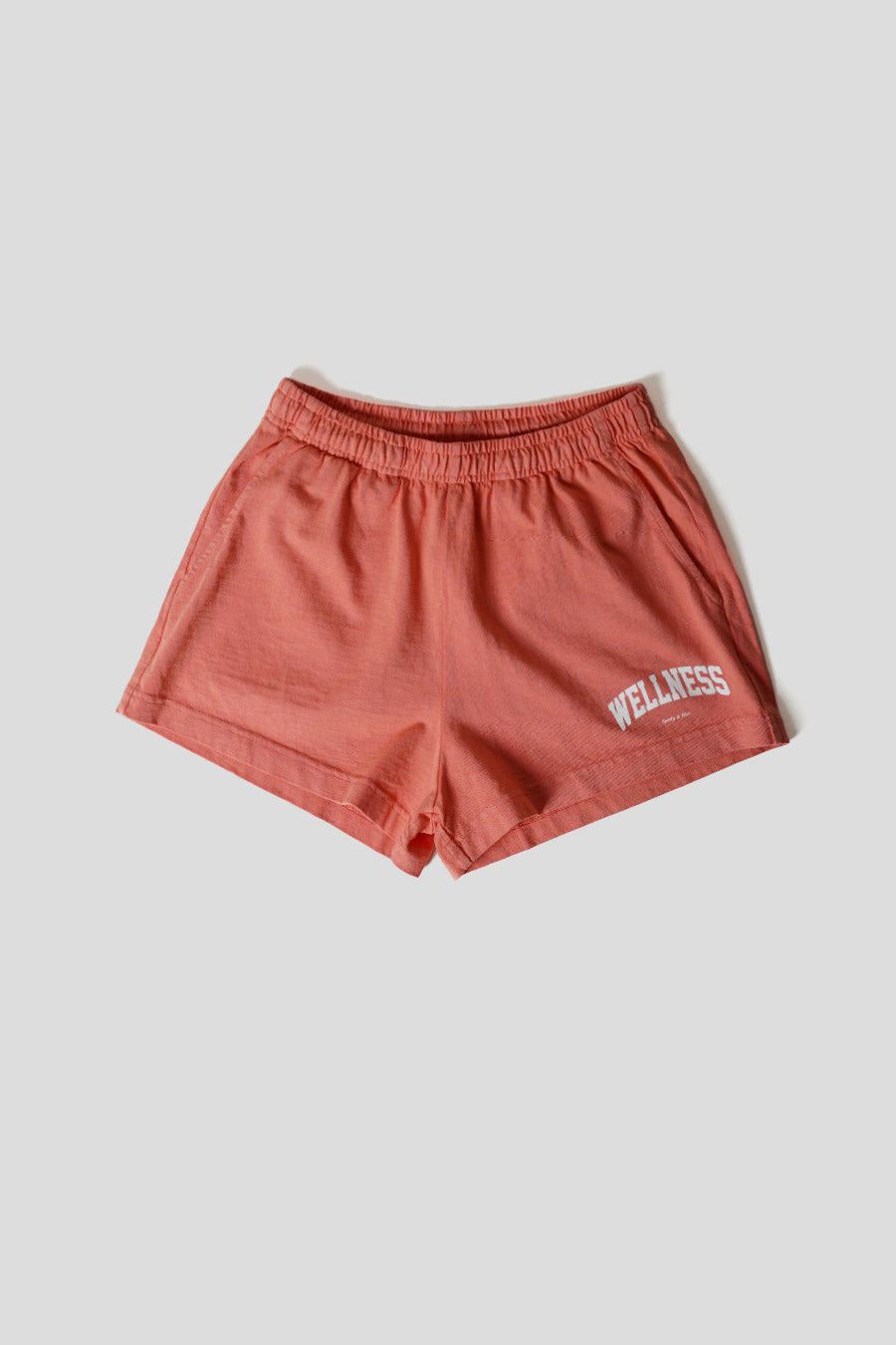 Sporty & Rich - IVY DISCO SALMON PINK WELLNESS SHORTS - LE LABO STORE