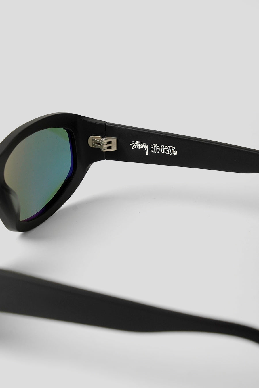Stussy - MATTE BLACK AND GREEN LENS LANDON SUNGLASSES – LE LABO STORE