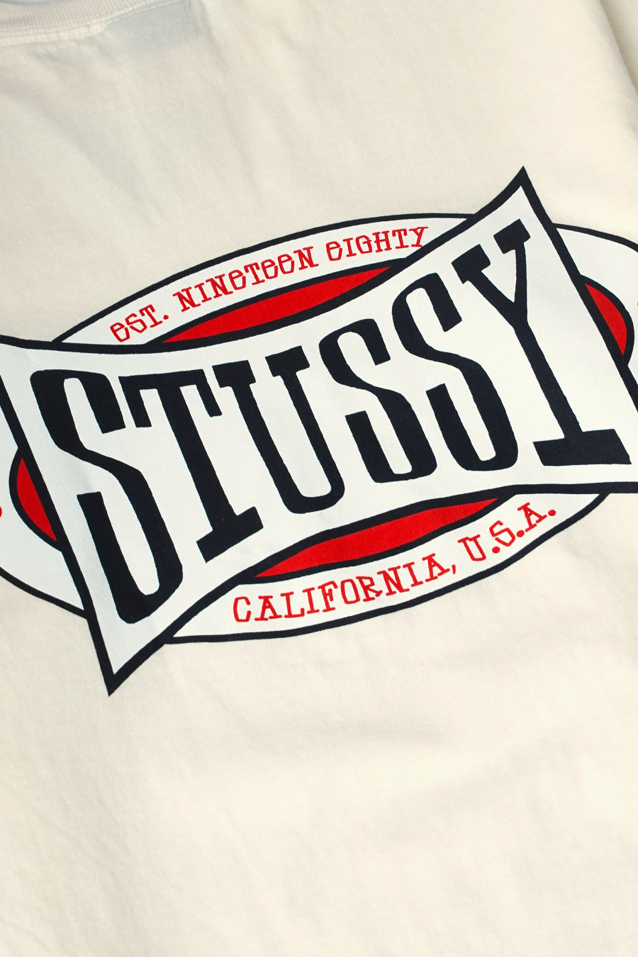 Stussy - T-SHIRT CHAMPION OVAL PIG. DYED BLANC NATUREL - LE LABO STORE