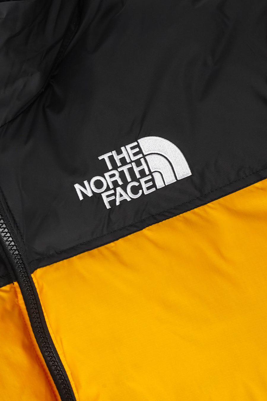 The North Face - DOUDOUNE 1996 RETRO NUPTSE JAUNE ET NOIRE - LE LABO STORE
