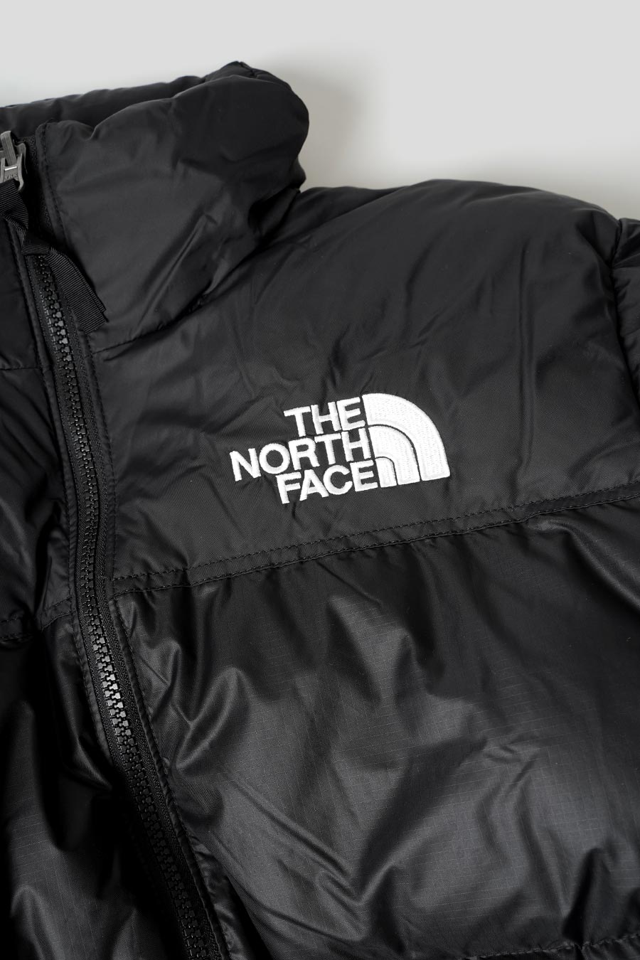 The North Face Logo Zipped Backpack - Farfetch