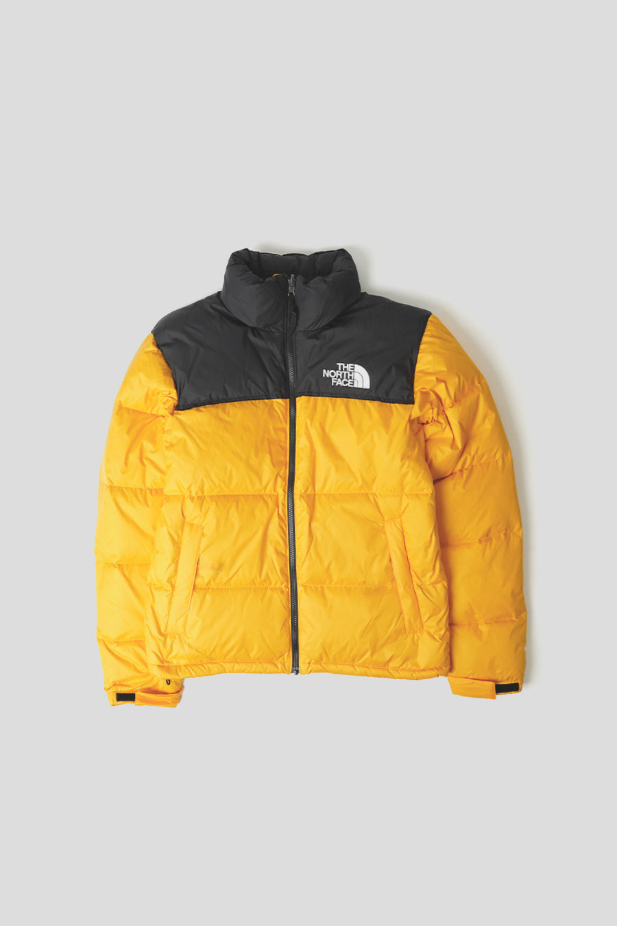 The North Face - VESTE NUPTSE 1996 SUMMIT GOLD ET TNF BLACK - LE LABO STORE