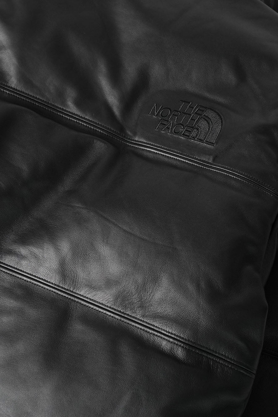 The North Face - DOUDOUNE LEATHER PACK 1996 NUPTSE NOIRE - LE LABO STORE