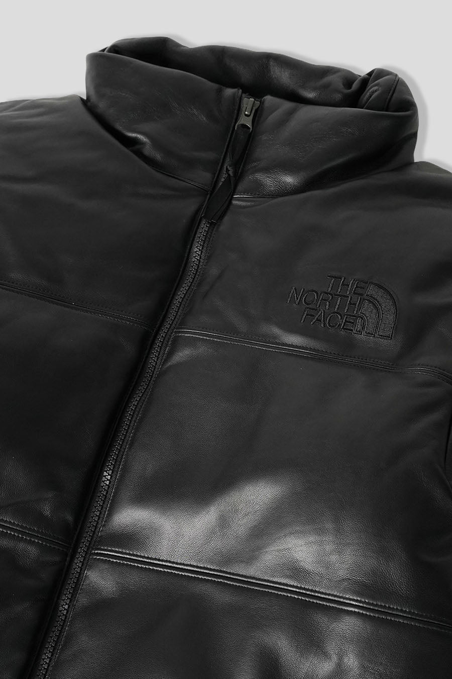 The North Face - DOUDOUNE LEATHER PACK 1996 NUPTSE NOIRE - LE LABO STORE