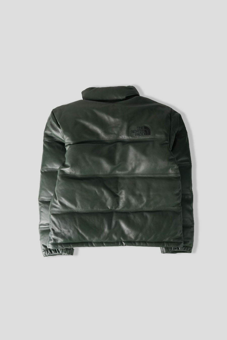 The North Face - LEATHER PACK 1996 NUPTSE DOWN JACKET DARK GREEN - LE LABO STORE
