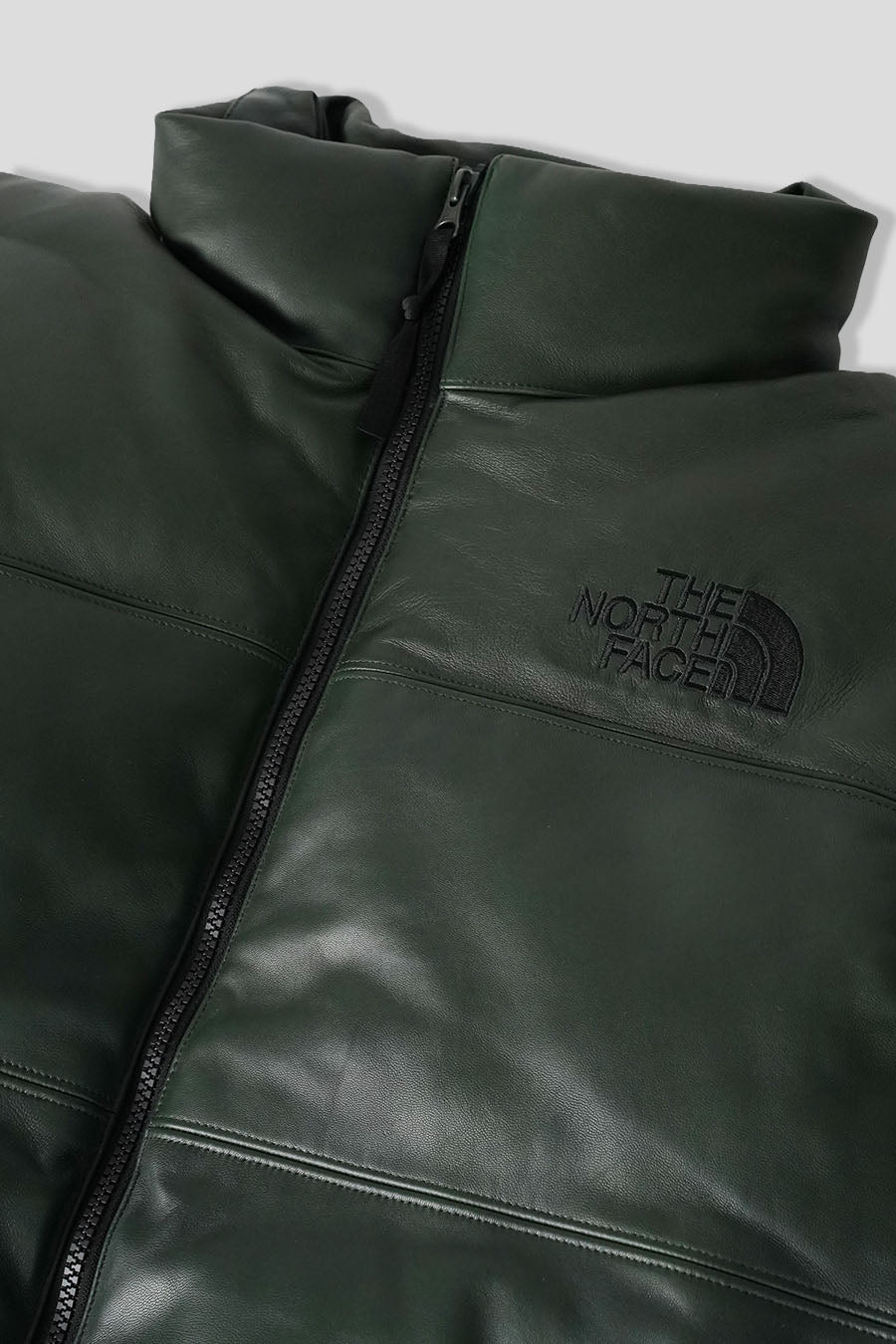 The North Face - LEATHER PACK 1996 NUPTSE DOWN JACKET DARK GREEN - LE LABO STORE