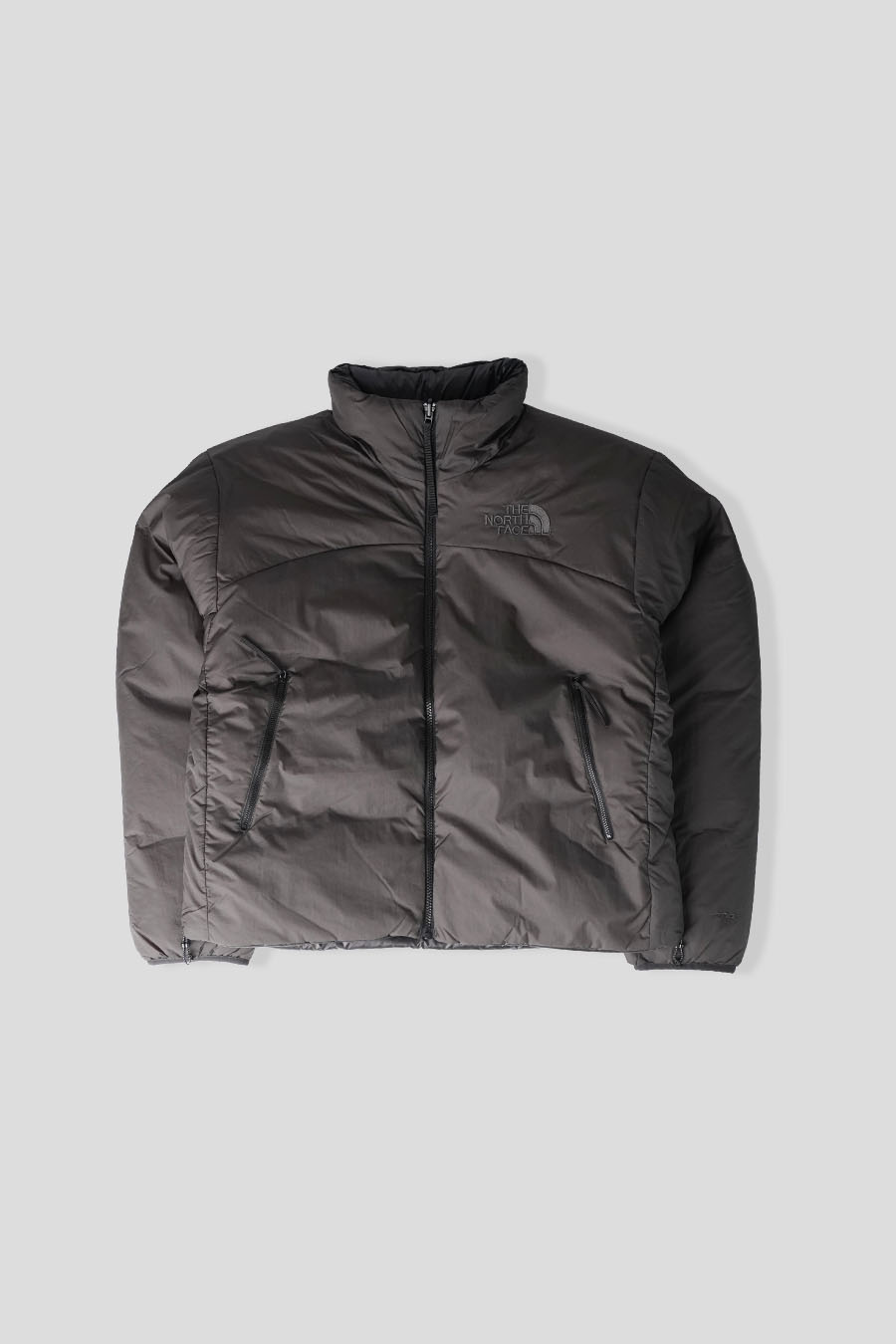 The North Face - DOUDOUNE PERTEX NUPTSE REVERSIBLE NOIR CHARBON - LE LABO STORE