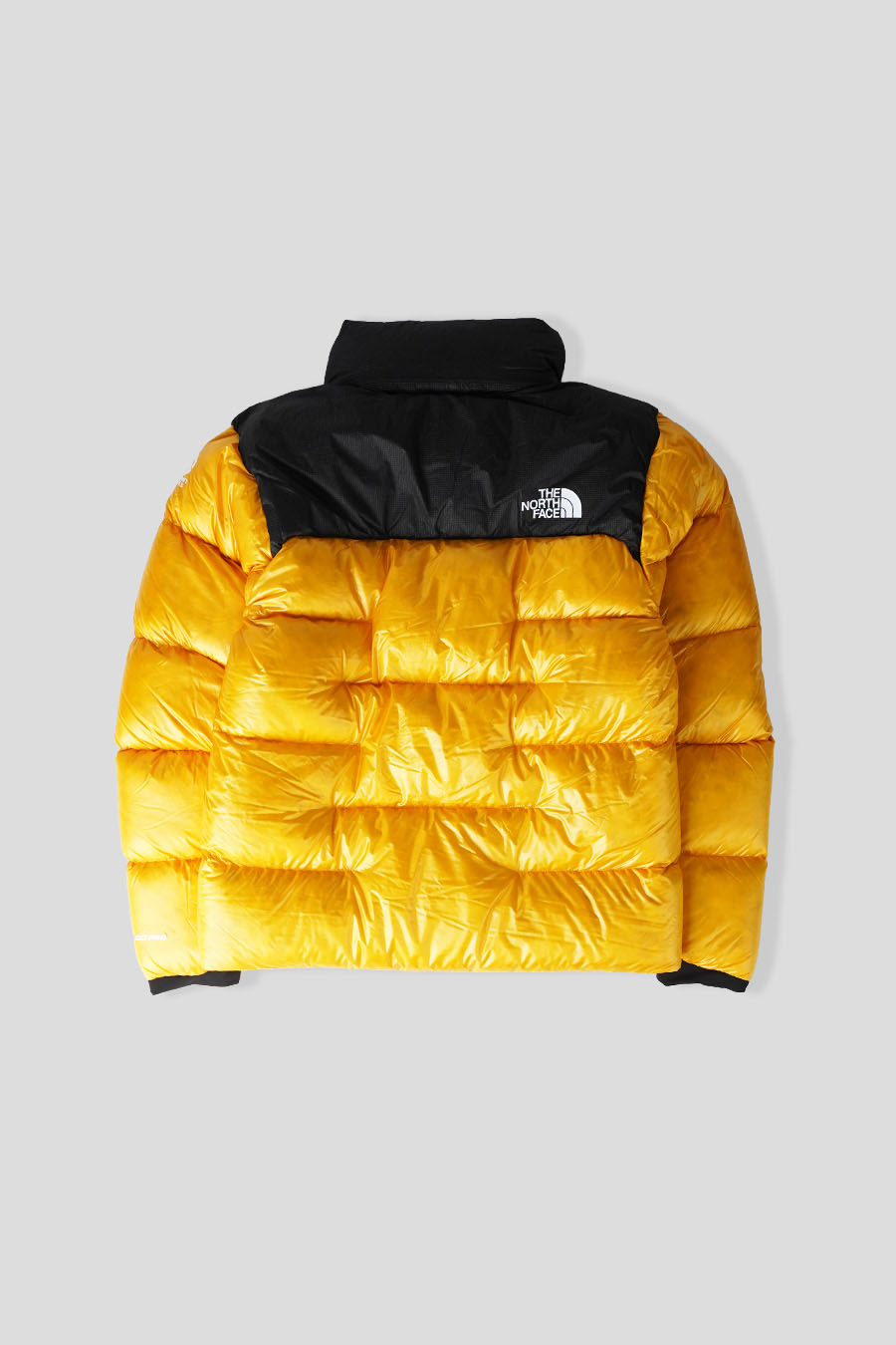 The North Face - DOUDOUNE SUMMIT NUPTSE JAUNE - LE LABO STORE