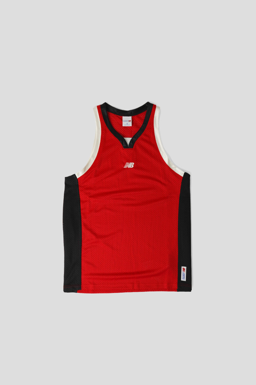 NEW BALANCE - MAILLOT DE BASKET-BALL PERFORMANCE ROUGE - LE LABO STORE