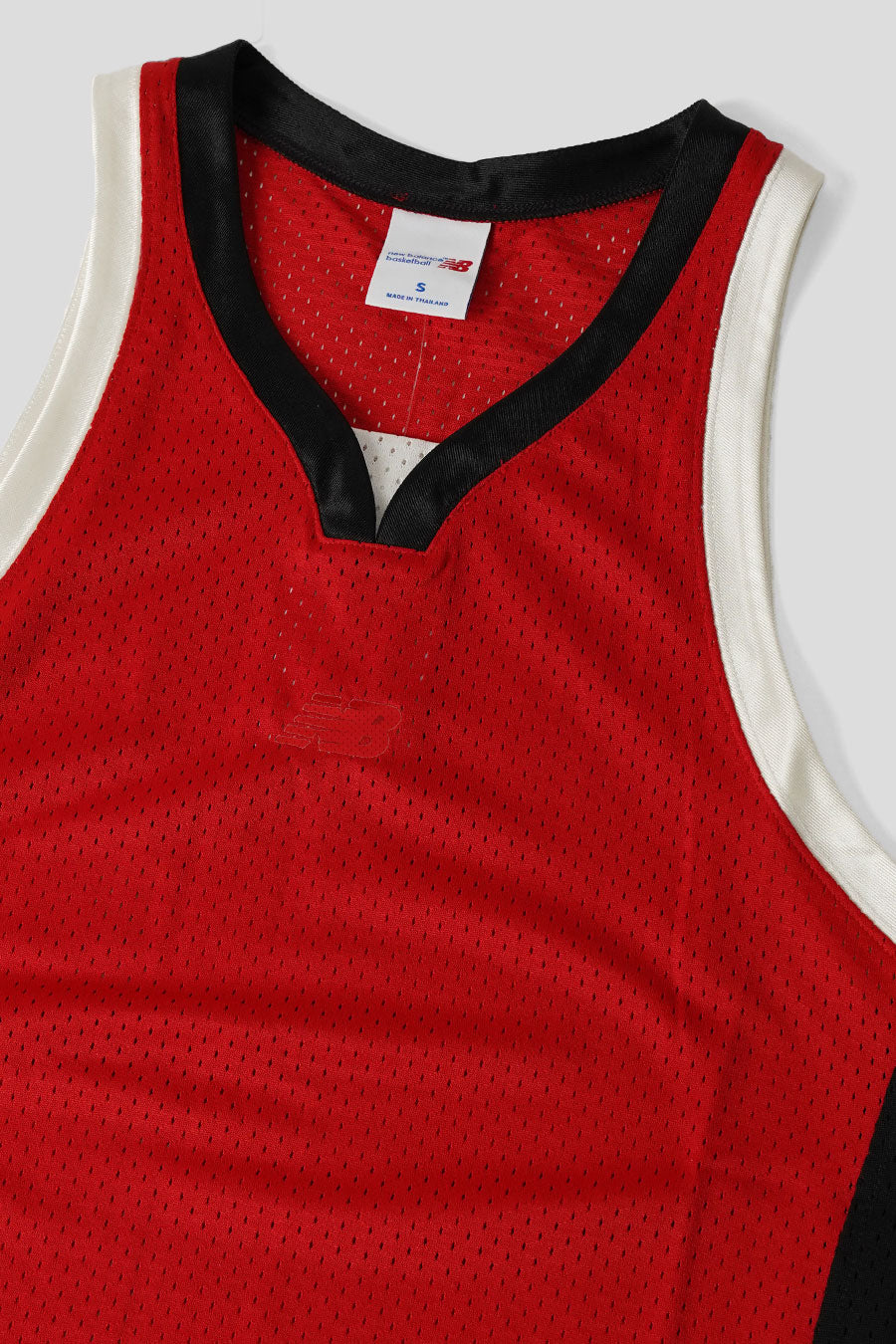 NEW BALANCE - MAILLOT DE BASKET-BALL PERFORMANCE ROUGE - LE LABO STORE